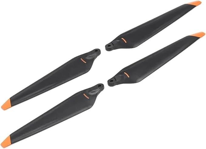 Four black drone propeller blades with orange tips arranged on a white background.