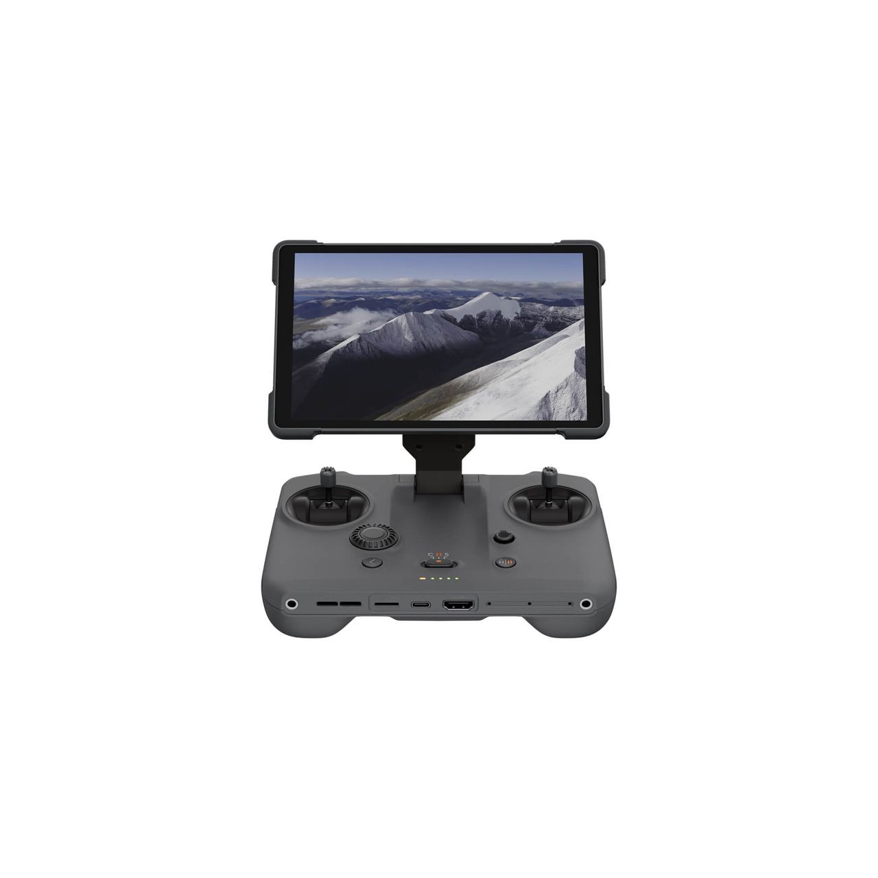 Drone controller with LCD display showing a snowy mountain landscape.