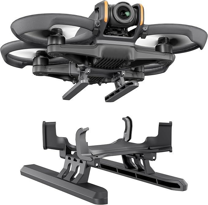 Close-up view of a black drone with a camera and an additional mounting accessory placed below it.