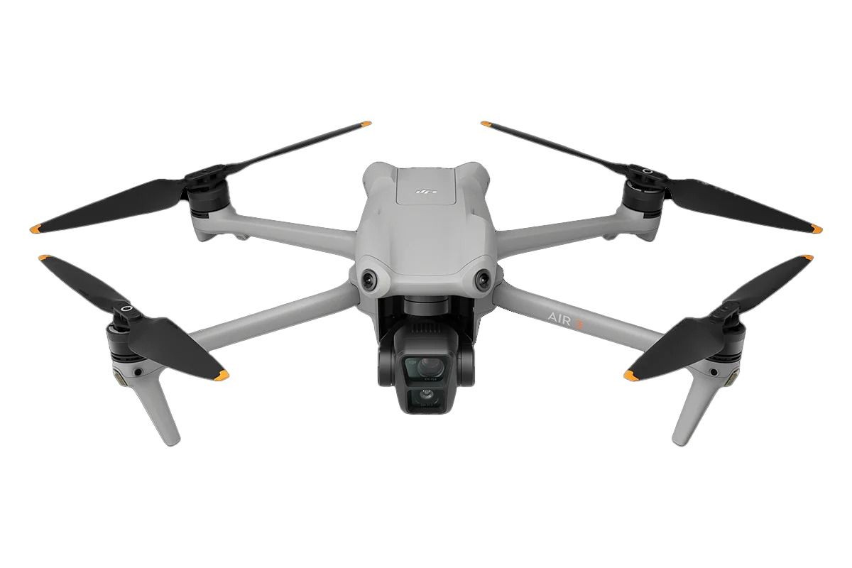 Gray quadcopter drone with orange accents and camera on white background.