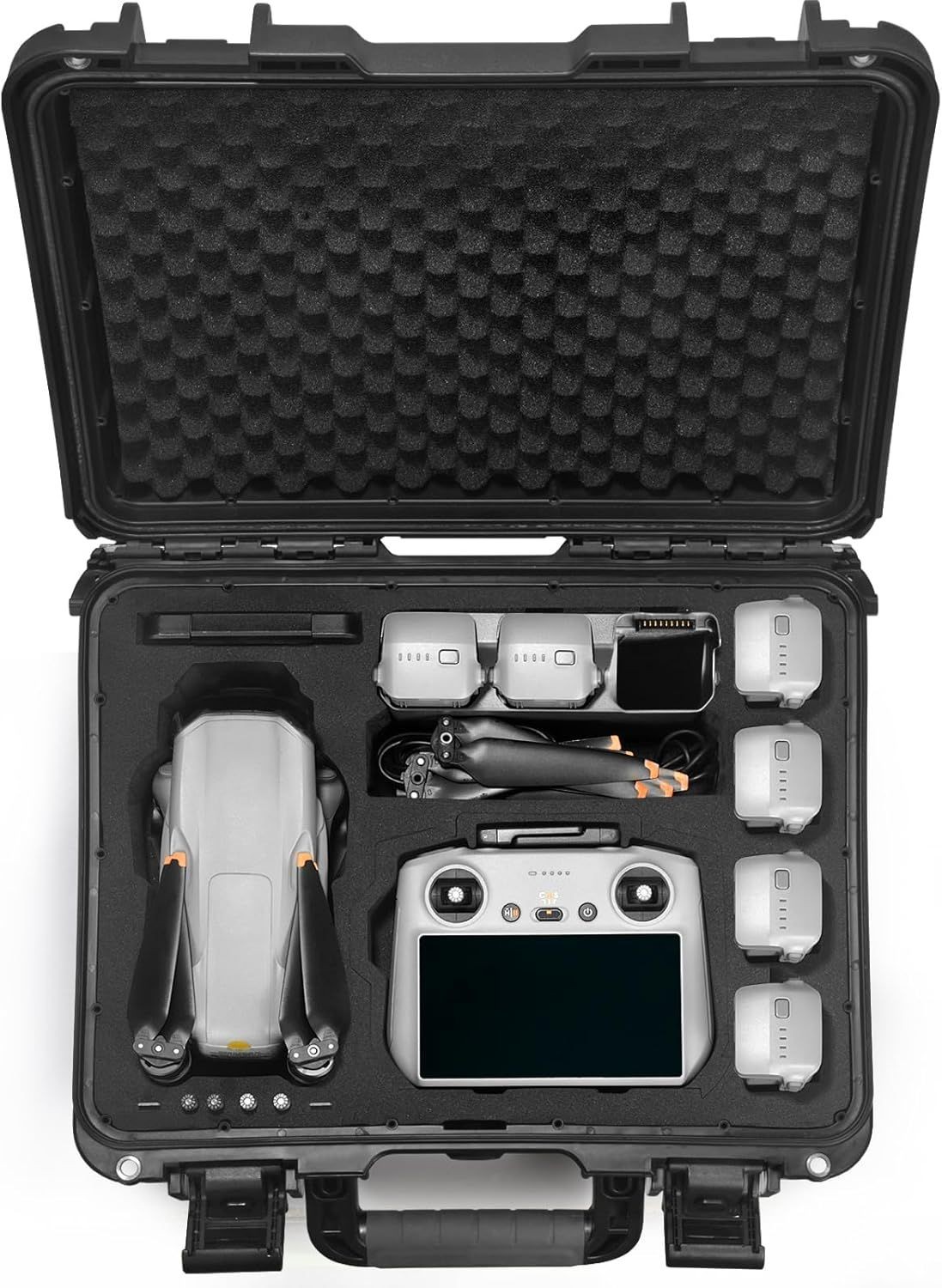 Open hard case with drone, remote control, batteries, and accessories neatly arranged in foam compartments.
